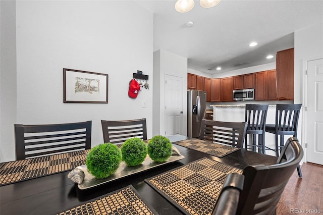 12753 Leyden St Unit C, Thornton, CO 80602 - dining room with wood finished floors and recessed lighting