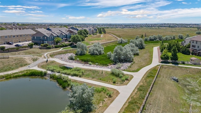 12753 Leyden St Unit C, Thornton, CO 80602 - aerial perspective of suburban area with a large body of water