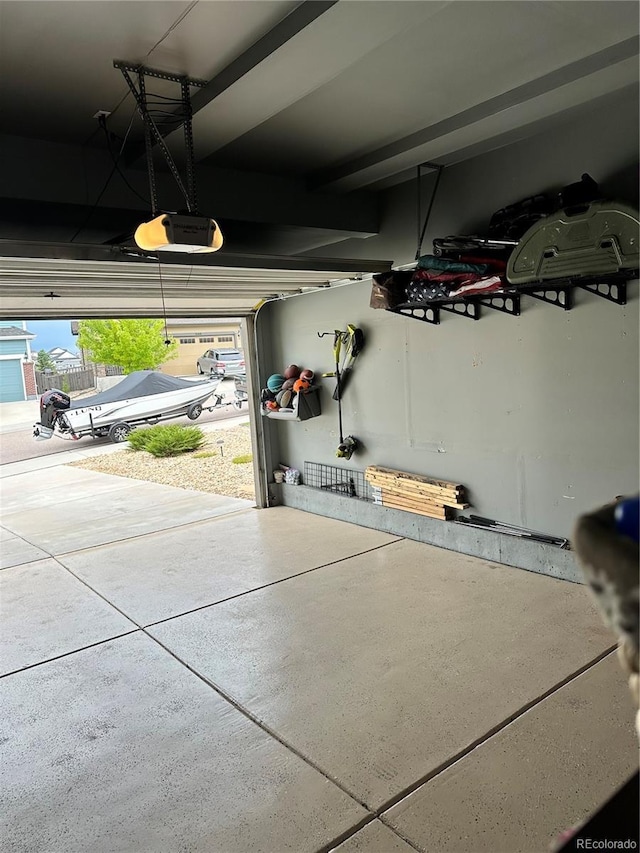 garage featuring a garage door opener