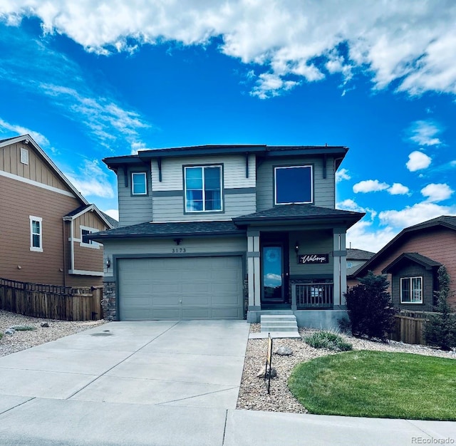 3173 Youngheart Way, Castle Rock, CO 80109 - view of front of home with driveway, a garage, and a porch