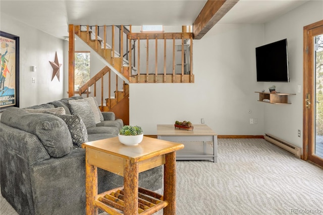 living room featuring carpet flooring, beam ceiling, plenty of natural light, and baseboard heating