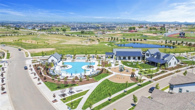 175 Westerly Blvd, Erie, CO 80516 - drone / aerial view of a pool area and a water and mountain view