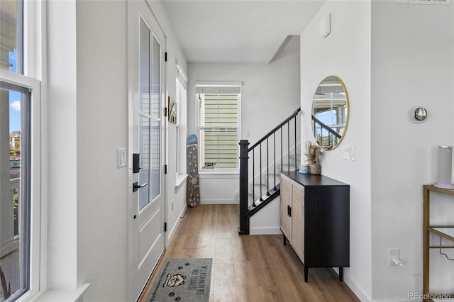 175 Westerly Blvd, Erie, CO 80516 - foyer entrance with wood finished floors and stairs