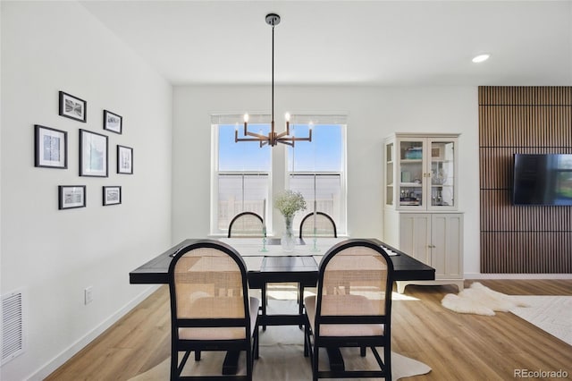 175 Westerly Blvd, Erie, CO 80516 - dining area featuring a chandelier, light wood-style floors, and recessed lighting