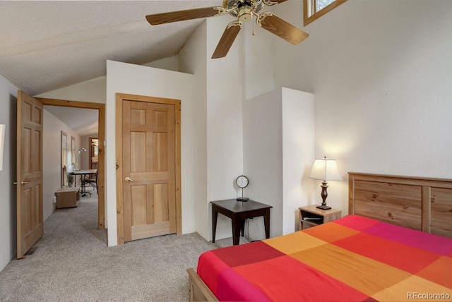 13190 Coyote Song Trl, Conifer, CO 80433 - bedroom featuring vaulted ceiling and light colored carpet