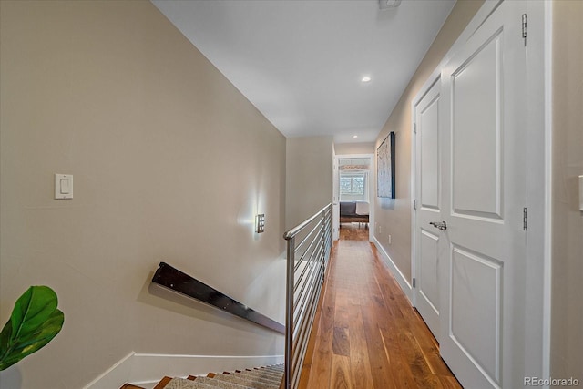 corridor featuring wood-type flooring