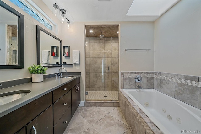 bathroom with vanity, plus walk in shower, and tile patterned flooring