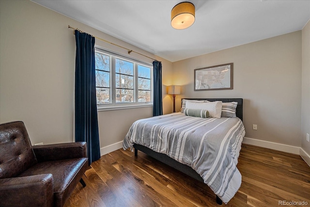 bedroom featuring dark wood-type flooring