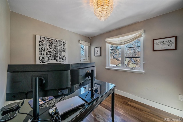 home office featuring an inviting chandelier and wood-type flooring