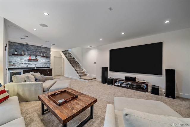 living room with bar and light colored carpet