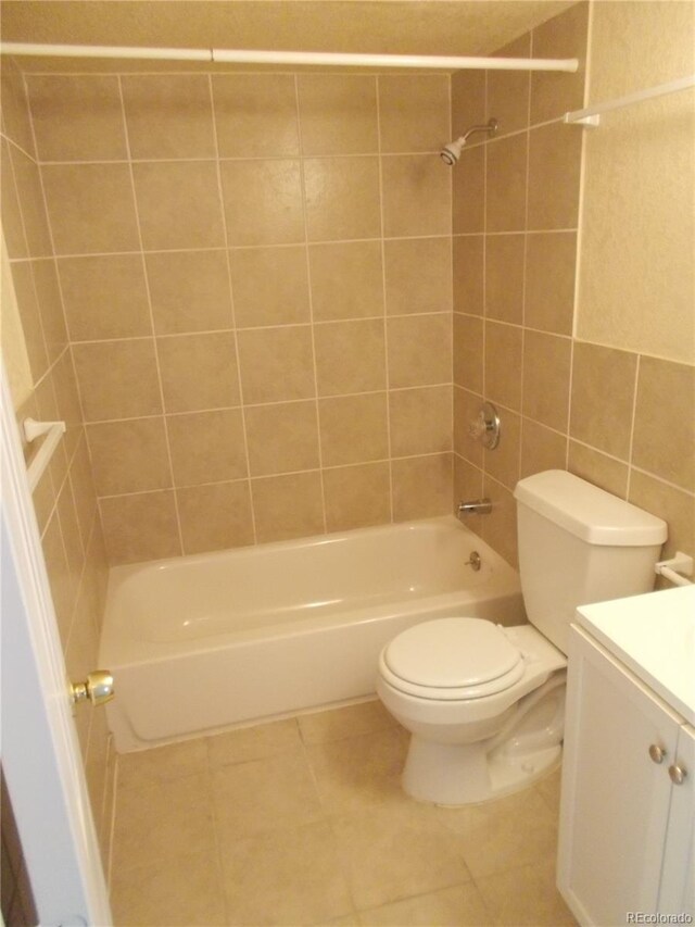 bathroom with toilet, tile patterned flooring, bathtub / shower combination, and vanity