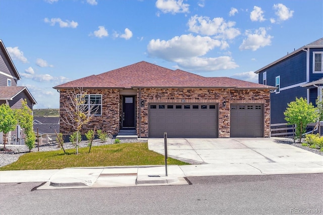 4992 Trails Edge Ln, Castle Rock, CO 80104 - view of front of property with a garage, concrete driveway, and a shingled roof
