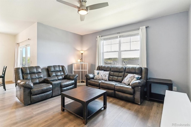 4992 Trails Edge Ln, Castle Rock, CO 80104 - living area with ceiling fan, light wood-style floors, and baseboards