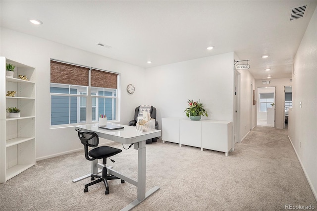 home office featuring light carpet