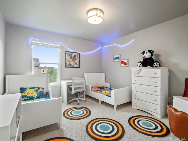 bedroom featuring carpet flooring