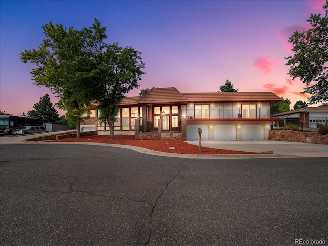 view of front of property featuring a garage