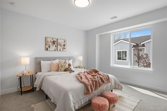 4018 Upham St, Wheat Ridge, CO 80033 - bedroom with baseboards, visible vents, and carpet