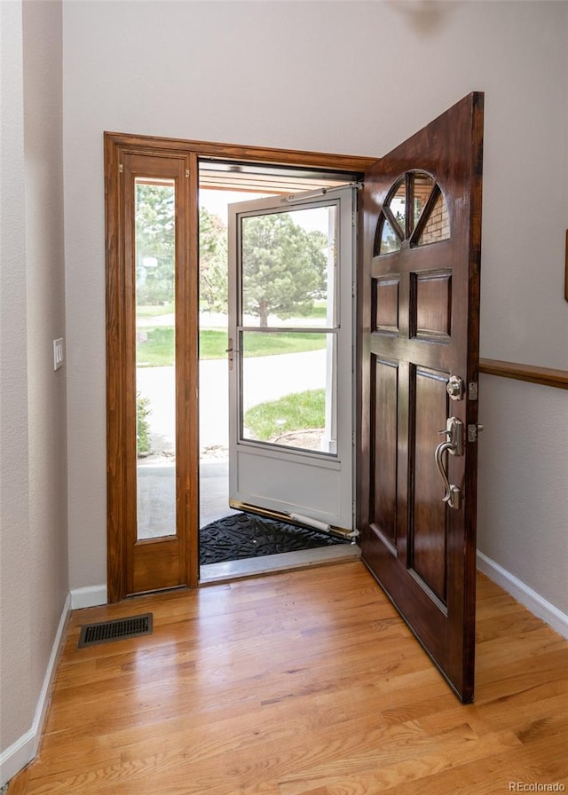 1660 Old Antlers Way, Monument, CO 80132 - foyer entrance with light wood-style flooring