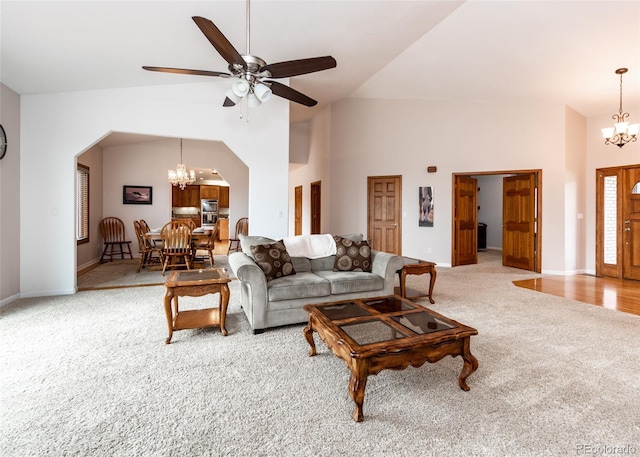 1660 Old Antlers Way, Monument, CO 80132 - living area with a chandelier, carpet floors, a ceiling fan, and high vaulted ceiling