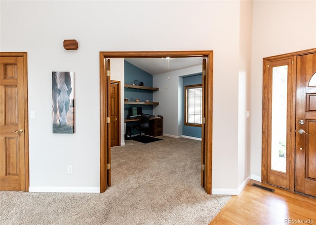 1660 Old Antlers Way, Monument, CO 80132 - entrance foyer with baseboards and light colored carpet