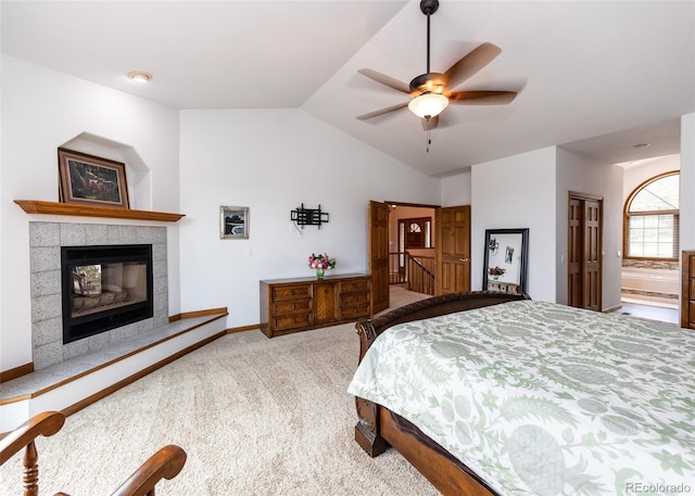 1660 Old Antlers Way, Monument, CO 80132 - carpeted bedroom with vaulted ceiling and a tile fireplace