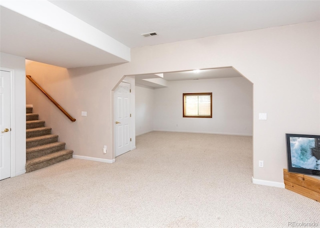1660 Old Antlers Way, Monument, CO 80132 - additional living space with carpet flooring, stairs, and arched walkways