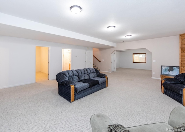 1660 Old Antlers Way, Monument, CO 80132 - carpeted living area featuring stairway and baseboards