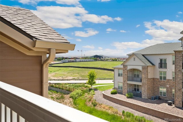 7440 S Blackhawk St Unit 7-303, Englewood, CO 80112 - view of yard featuring a balcony