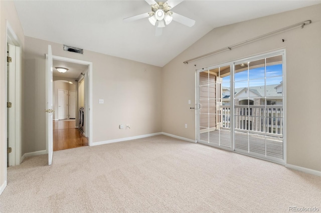 7440 S Blackhawk St Unit 7-303, Englewood, CO 80112 - unfurnished bedroom with access to exterior, carpet, baseboards, vaulted ceiling, and a ceiling fan
