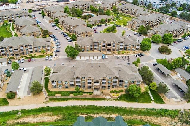 7440 S Blackhawk St Unit 7-303, Englewood, CO 80112 - aerial view of property and surrounding area with nearby suburban area