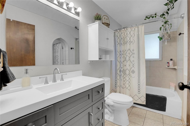 full bath featuring shower / bath combination with curtain, vanity, toilet, and tile patterned floors