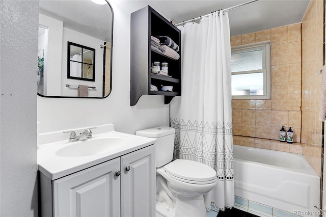 bathroom featuring toilet, shower / bath combo, and vanity