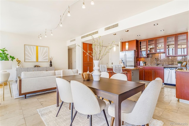 dining space featuring light tile patterned floors, recessed lighting, and visible vents