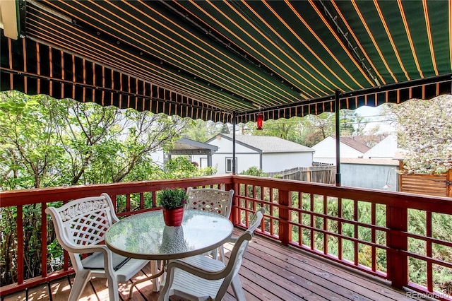 1275 Niagara St, Denver, CO 80220 - wooden terrace with outdoor dining space