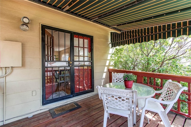1275 Niagara St, Denver, CO 80220 - wooden deck featuring outdoor dining area