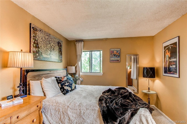 1275 Niagara St, Denver, CO 80220 - carpeted bedroom featuring a textured ceiling and baseboards
