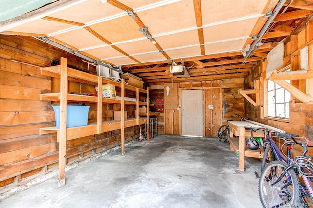 1275 Niagara St, Denver, CO 80220 - garage featuring a garage door opener