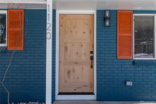 1120 Hartford Dr, Boulder, CO 80305 - entrance to property featuring brick siding