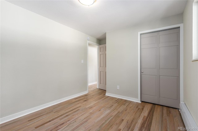 1120 Hartford Dr, Boulder, CO 80305 - unfurnished bedroom featuring light wood-style floors and a closet