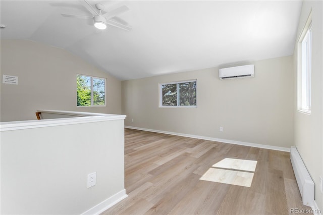 1120 Hartford Dr, Boulder, CO 80305 - empty room featuring a baseboard heating unit, a wall mounted air conditioner, vaulted ceiling, wood finished floors, and ceiling fan