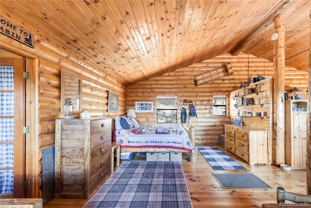 73 Elk Way, Drake, CO 80515 - bedroom with lofted ceiling, rustic walls, wood ceiling, and wood-type flooring