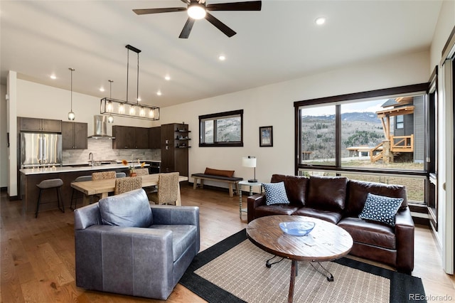 17 Vendette Rd, Silverthorne, CO 80498 - living room with ceiling fan, lofted ceiling, wood finished floors, and recessed lighting