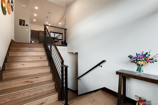 17 Vendette Rd, Silverthorne, CO 80498 - stairway with wood finished floors and recessed lighting