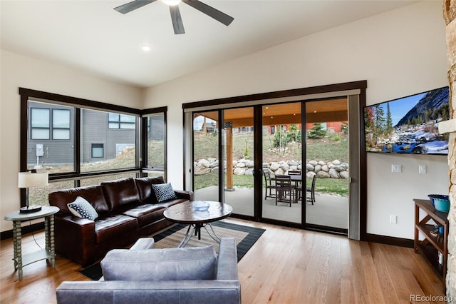 17 Vendette Rd, Silverthorne, CO 80498 - living room featuring a ceiling fan, light wood-style floors, and baseboards