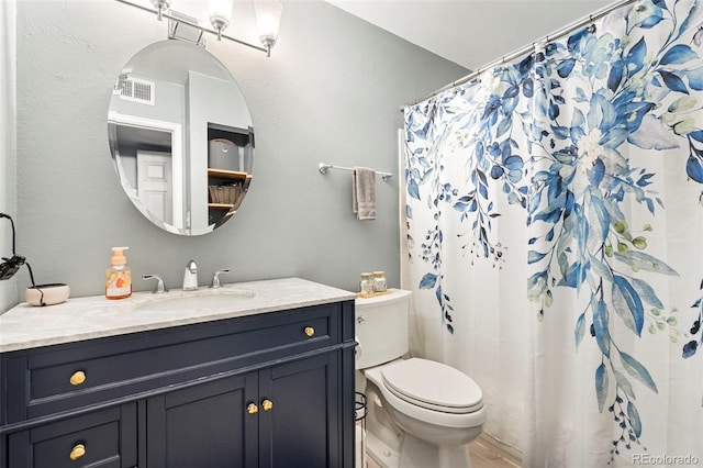 3663 S Sheridan Blvd Unit O15, Denver, CO 80235 - bathroom featuring vanity and a shower with curtain