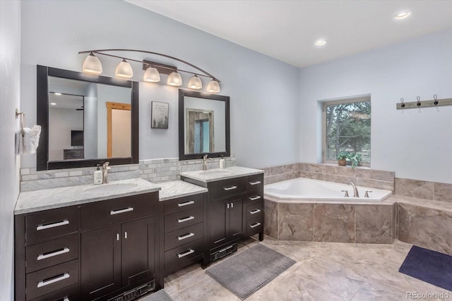 17158 County Road 363, Buena Vista, CO 81211 - full bath with vanity, a garden tub, backsplash, and recessed lighting