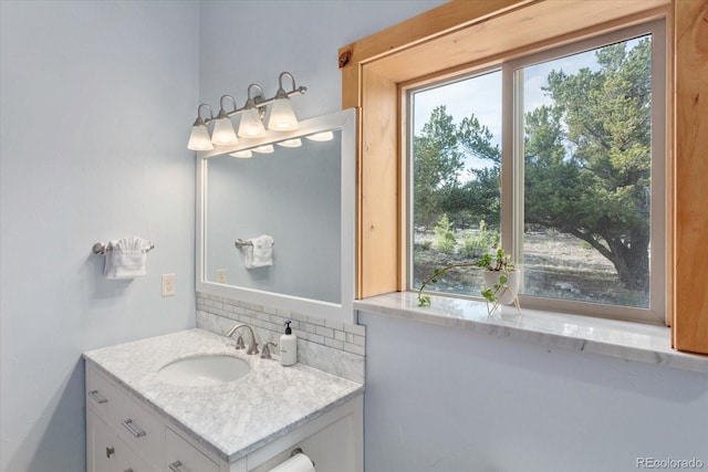 17158 County Road 363, Buena Vista, CO 81211 - bathroom featuring decorative backsplash and vanity