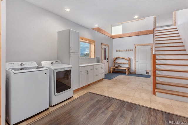 17158 County Road 363, Buena Vista, CO 81211 - laundry room featuring separate washer and dryer, cabinet space, light wood-type flooring, and recessed lighting