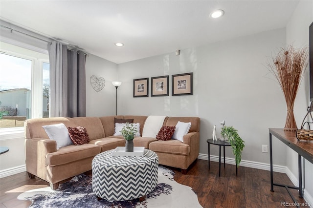 living area with recessed lighting, baseboards, and wood finished floors