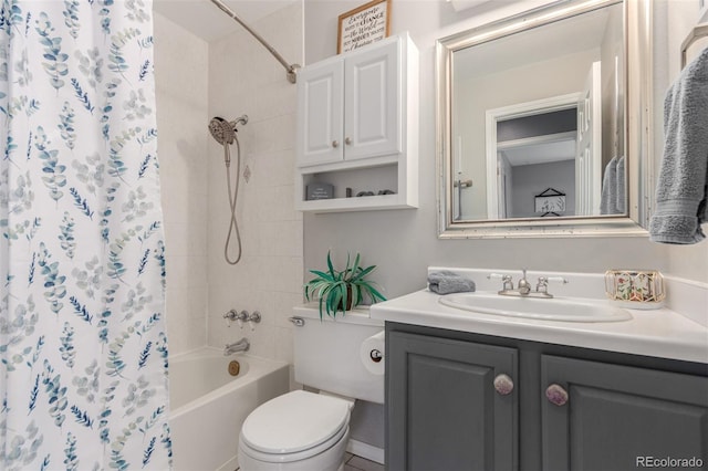 full bath with shower / bathtub combination with curtain, toilet, and vanity